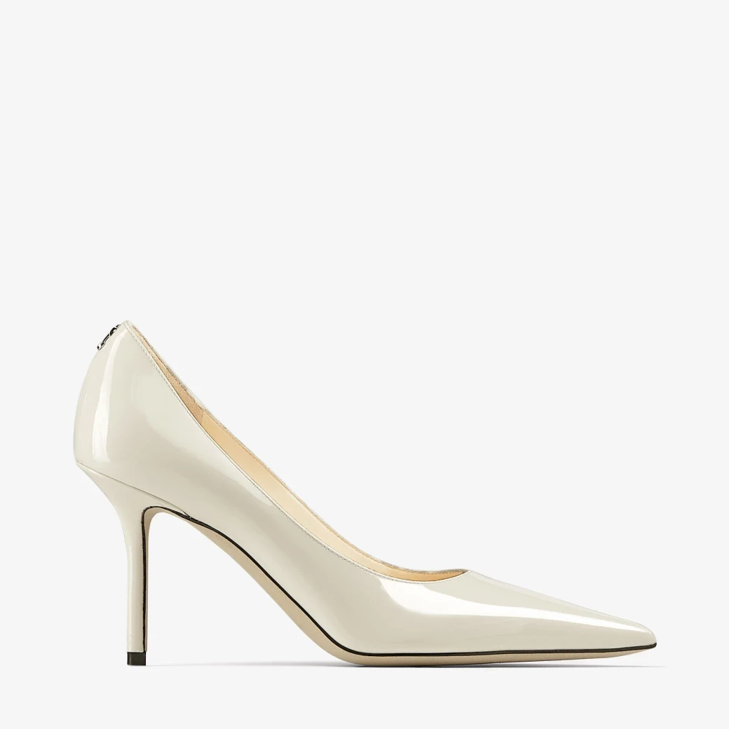 Latte Patent Leather Pumps with JC Emblem