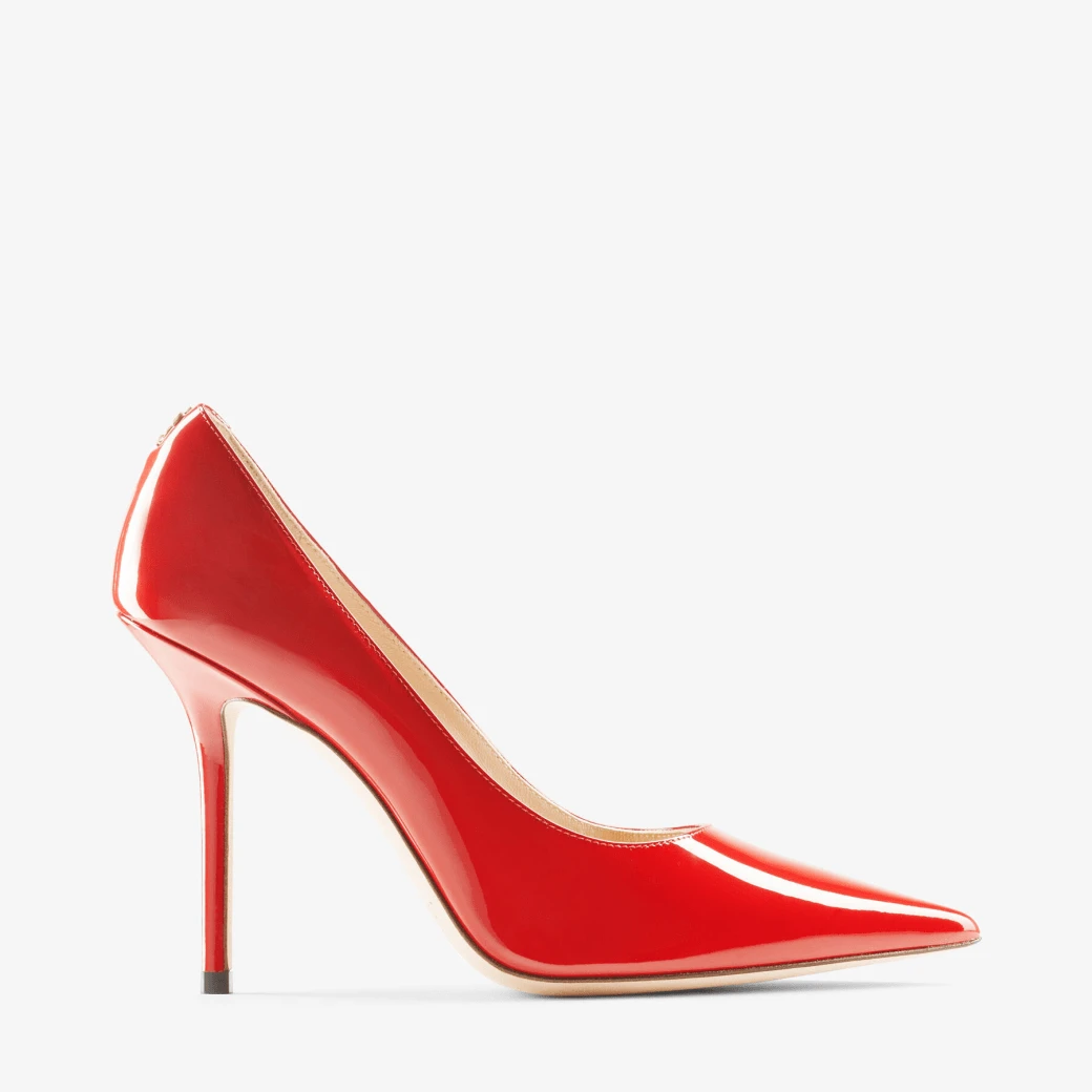 Red Patent Leather Pointed-Toe Pumps with JC Emblem