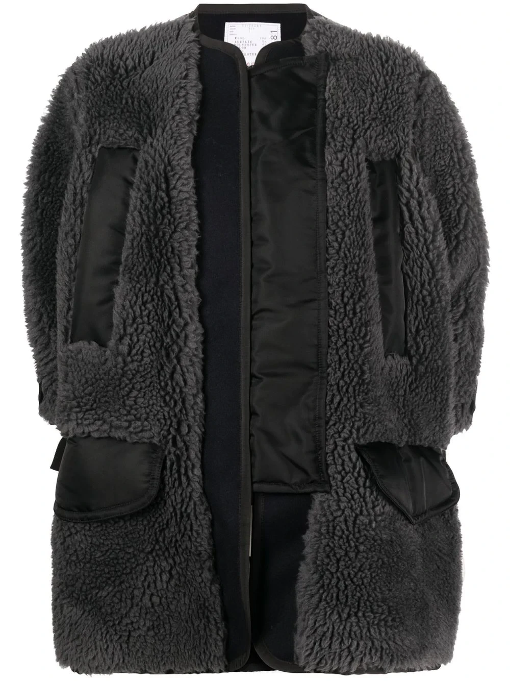 sacai crop-sleeve panelled shearling coat