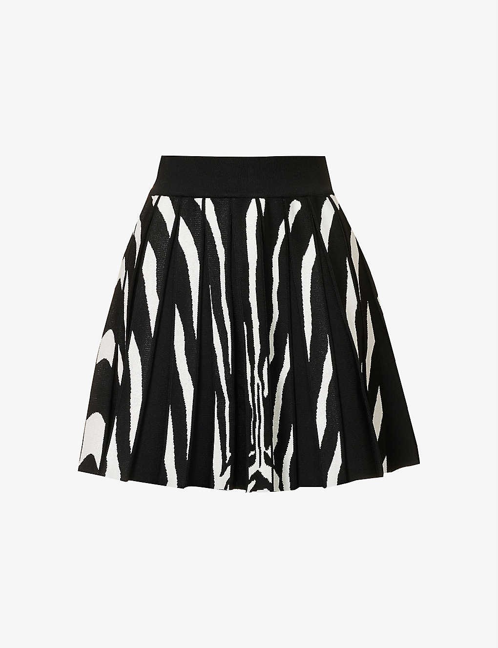 Zebra-pattern pleated knitted mini skirt